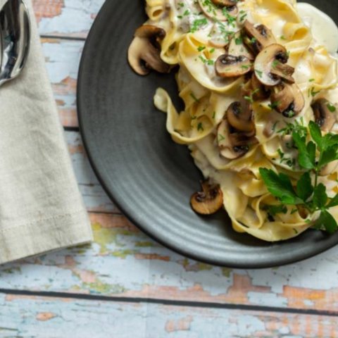 Fresh Tagliatelle pasta with creamy mushroom sauce